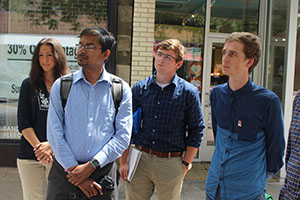 Four urban planning students listening to presenter