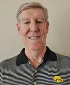 Headshot of Jim Huling, wearing a striped Hawkeye shirt.
